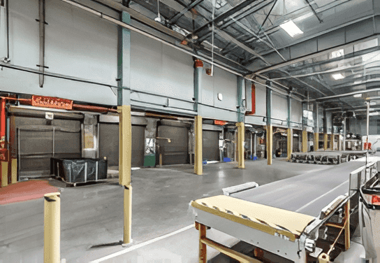 Dock doors and roller conveyors inside the warehouse